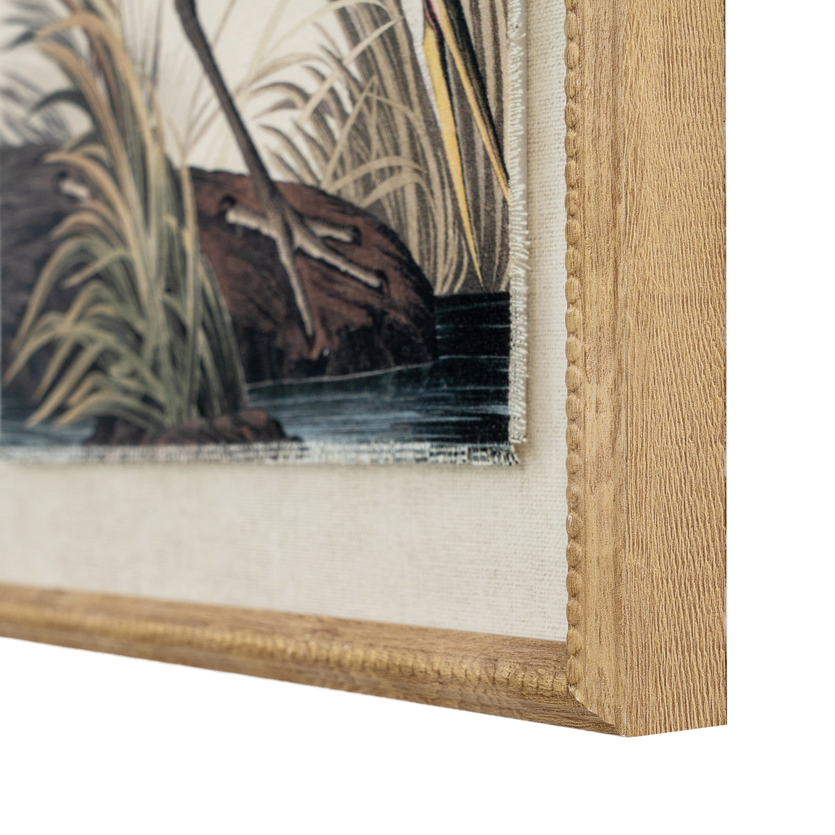 Heron on linen in beaded frame