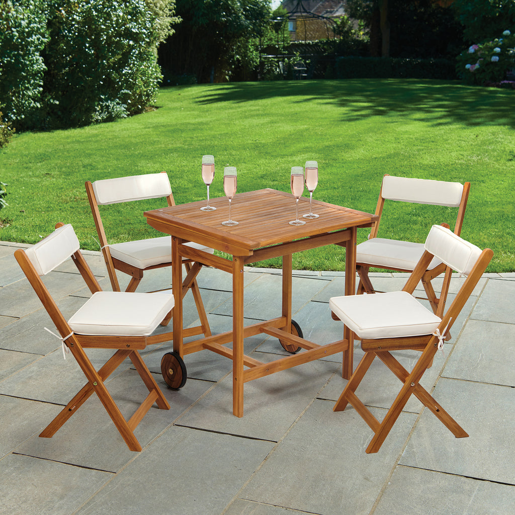 Wooden outdoor dining set with four chairs.